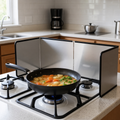 Three-panel stainless steel oil splash guard around a pan